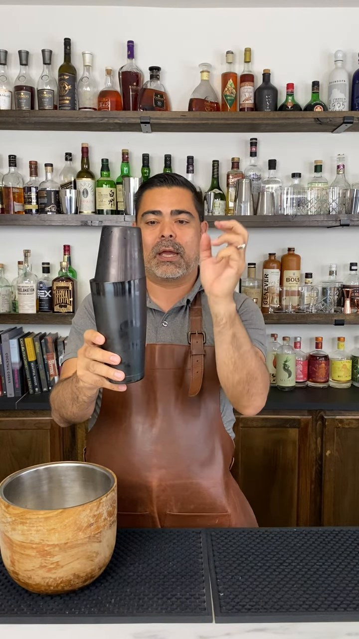 A Bar Above bartender holding a Boston shaker, from the 2-minute how-to guide video